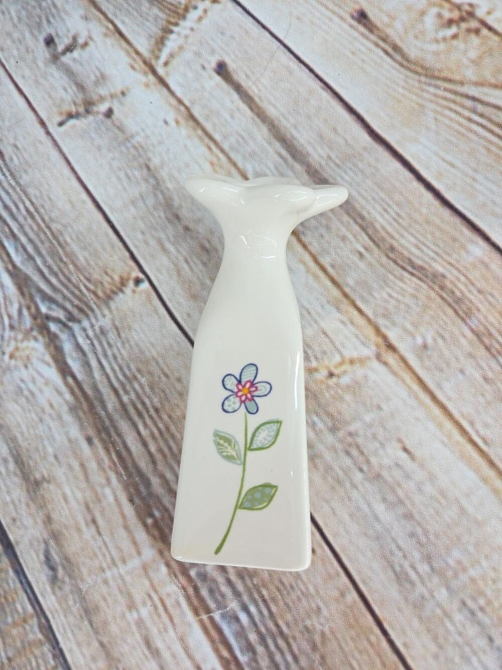 Grasslands Road Flower Shaped Bud White Vase With Blue Flower